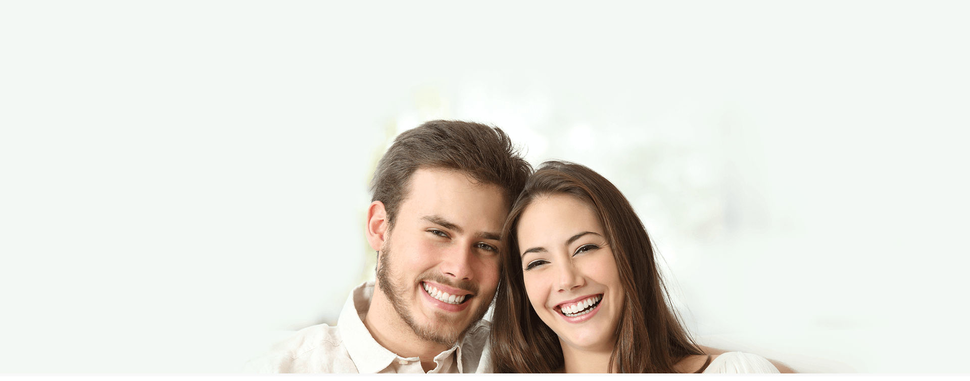 Smiling Young Couple about the dental procedures